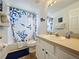 Bathroom featuring a tub-shower combination, a toilet, a vanity with cabinets and drawers at 1426 Park Park, Haines City, FL 33844