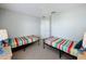 Bedroom with two twin beds, neutral walls, and wall-to-wall carpet at 1426 Park Park, Haines City, FL 33844