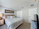 This bedroom provides ample storage with a double closet and a clean, cozy, and restful space at 1426 Park Park, Haines City, FL 33844