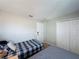 Bedroom featuring two twin beds, a closet, beige carpet, and neutral walls at 1426 Park Park, Haines City, FL 33844