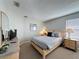 Cozy bedroom featuring a comfortable bed, dresser, and soft lighting to create a relaxing atmosphere at 1426 Park Park, Haines City, FL 33844