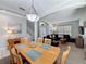 Spacious dining area connected to the living room, perfect for entertaining guests and Gathering gatherings at 1426 Park Park, Haines City, FL 33844