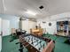 Large garage space furnished with multiple games at 1426 Park Park, Haines City, FL 33844