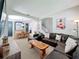 Open-concept living room and dining area, with a cozy seating arrangement and natural light at 1426 Park Park, Haines City, FL 33844