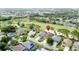 This aerial perspective highlights golf course access and desirable community living at 1428 Park Pl, Haines City, FL 33844