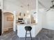 The white kitchen has stainless steel appliances, plenty of cabinet space and a breakfast bar at 1428 Park Pl, Haines City, FL 33844