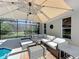 Relaxing screened-in pool area with comfortable seating and ample shade for outdoor enjoyment at 1428 Park Pl, Haines City, FL 33844