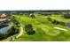 Expansive golf course with manicured greens, water features, and surrounding community at 14344 Swanley St, Orlando, FL 32832