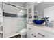 Bathroom featuring blue glass vessel sink, modern vanity, glass shower at 14421 Ward Rd, Orlando, FL 32824