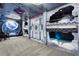 Unique space-themed bedroom with custom bunk beds and immersive design at 1456 Belle Terre Rd, Davenport, FL 33896