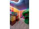 Exciting bedroom featuring decor and a slide, creating a playful and unique design at 1560 Maidstone Ct, Davenport, FL 33896