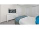 Bright bedroom with a TV and modern decor creates a welcoming atmosphere at 1560 Maidstone Ct, Davenport, FL 33896