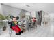 A cozy dining area with seating for eight at 1560 Maidstone Ct, Davenport, FL 33896