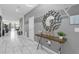 Bright entryway boasting modern decor and white marble floors at 1560 Maidstone Ct, Davenport, FL 33896