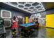 Large game room with custom lighting and decor featuring a pool table and Star Wars-themed murals at 1560 Maidstone Ct, Davenport, FL 33896