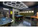 Spacious game room with billiards, air hockey, pinball, and custom lighting at 1560 Maidstone Ct, Davenport, FL 33896