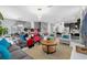 Spacious living room flows into kitchen/dining areas creating an inviting space at 1560 Maidstone Ct, Davenport, FL 33896