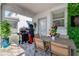 Outdoor kitchen with grill, dining area, TV, and entertaining space perfect for gatherings at 1560 Maidstone Ct, Davenport, FL 33896