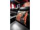 Close-up of the theater room seatings featuring decorative movie-themed pillows at 1560 Maidstone Ct, Davenport, FL 33896