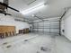 Spacious garage with plenty of room for storage and parking at 1590 The Oaks Blvd, Kissimmee, FL 34746