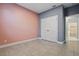 Bedroom showcasing tile floors, closet, and fresh paint, providing a blank canvas for personalization at 168 Jensen Dr, Groveland, FL 34736