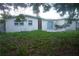 Charming single-story home featuring neutral paint, a fenced yard, and a welcoming facade at 2005 Kingsland Ave, Orlando, FL 32808
