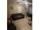 Inviting living room with neutral paint, a ceiling fan, and tile floors at 2005 Kingsland Ave, Orlando, FL 32808