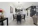 Dining area adjacent to the kitchen, ideal for Gathering meals and entertaining at 2151 Valencia Blossom St, Clermont, FL 34711