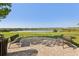 Scenic lake view from community patio, perfect for relaxing and enjoying the outdoors at 2151 Valencia Blossom St, Clermont, FL 34711