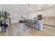 Open-concept kitchen featuring white cabinets, granite countertops, and a spacious center island at 2224 Celebration Blvd, Celebration, FL 34747