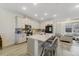 Beautiful kitchen features granite countertops, a center island with seating, and stainless steel appliances at 2224 Celebration Blvd, Celebration, FL 34747