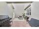 Cozy covered patio with stylish seating, perfect for relaxing and entertaining at 2224 Celebration Blvd, Celebration, FL 34747