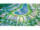 Aerial view of homes around a pond, lush landscaping, and well-maintained neighborhood at 233 Rialto Rd, Kissimmee, FL 34759