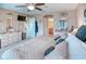 Spacious bedroom with dressers, ensuite bathroom, and walk in closet at 233 Rialto Rd, Kissimmee, FL 34759