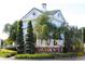Elegant gated community entrance with manicured landscaping and decorative signage for Providence at 2333 Pinehurst Ct, Davenport, FL 33837