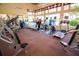 Well-equipped fitness center with treadmills and weight machines, promoting a healthy lifestyle at 2333 Pinehurst Ct, Davenport, FL 33837