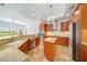 Spacious kitchen with granite counters, stainless appliances, and a central island at 2333 Pinehurst Ct, Davenport, FL 33837