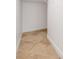 Walk-in closet features tile flooring and clean white walls with white trim at 2333 Pinehurst Ct, Davenport, FL 33837