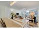 Inviting living area and dining space with stylish decor, a ceiling fan, and lots of natural light at 2743 N Poinciana Blvd # 55, Kissimmee, FL 34746