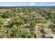 Aerial view showcasing the property with mature trees and neighborhood at 304 W 24Th St, Sanford, FL 32771