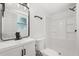 Modern bathroom featuring white fixtures and sleek black hardware at 304 W 24Th St, Sanford, FL 32771