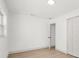Empty bedroom features wood-look floors, a large closet, and ample space for customization at 304 W 24Th St, Sanford, FL 32771