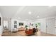 Bright and airy living room featuring sleek flooring, contemporary furnishings, and an inviting atmosphere at 304 W 24Th St, Sanford, FL 32771
