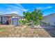 Spacious backyard with a storage shed and partial fencing at 3193 Whispering Trails Ave, Winter Haven, FL 33884