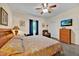 This bedroom includes a dresser, comfortable bed, and relaxing recliner, creating a relaxing retreat at 3193 Whispering Trails Ave, Winter Haven, FL 33884