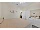 Bright bedroom with a serene atmosphere, featuring a dresser, mirror and closet for storage at 3193 Whispering Trails Ave, Winter Haven, FL 33884