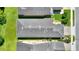 A high aerial view of the roof, landscaping, and surrounding houses in the neighborhood at 328 Toldedo Rd, Davenport, FL 33837