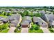 An aerial view captures the home's front exterior, landscaping, and surrounding neighborhood at 328 Toldedo Rd, Davenport, FL 33837