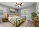 Inviting bedroom with natural light, ceiling fan, and a serene ambiance at 328 Toldedo Rd, Davenport, FL 33837