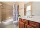 Bathroom with shower-tub combo, single vanity, and geometric shower curtain at 3759 Eagle Isle Cir, Kissimmee, FL 34746